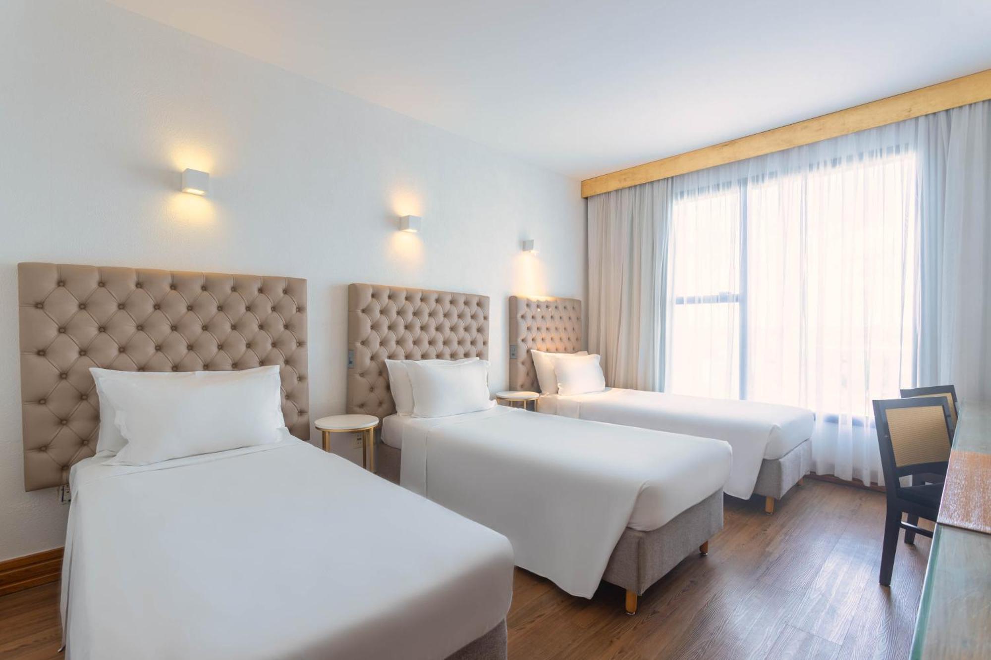 Ouro Minas Hotel Belo Horizonte, Dolce By Wyndham ภายนอก รูปภาพ A room at the hotel