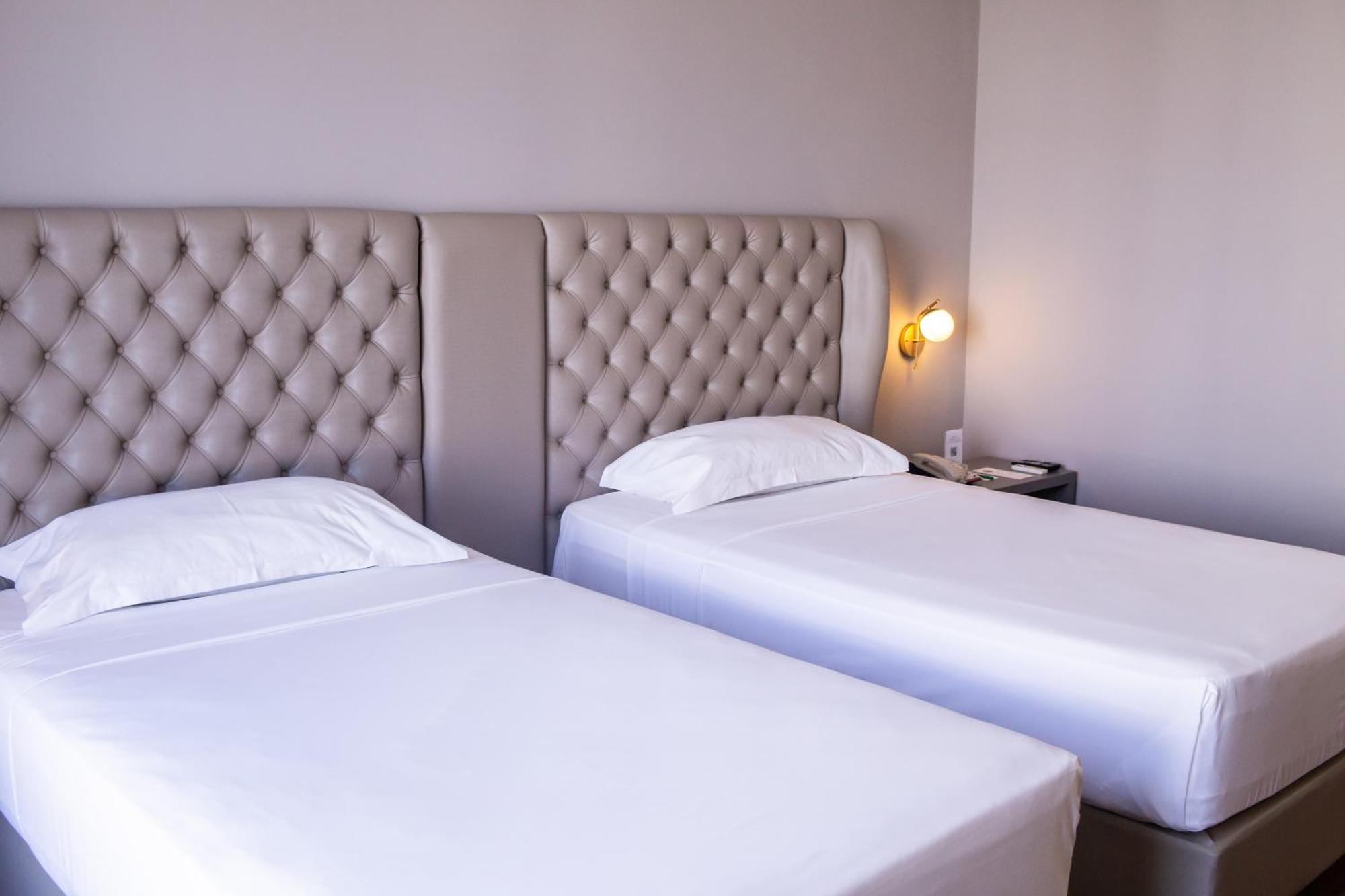 Ouro Minas Hotel Belo Horizonte, Dolce By Wyndham ภายนอก รูปภาพ A room at the hotel