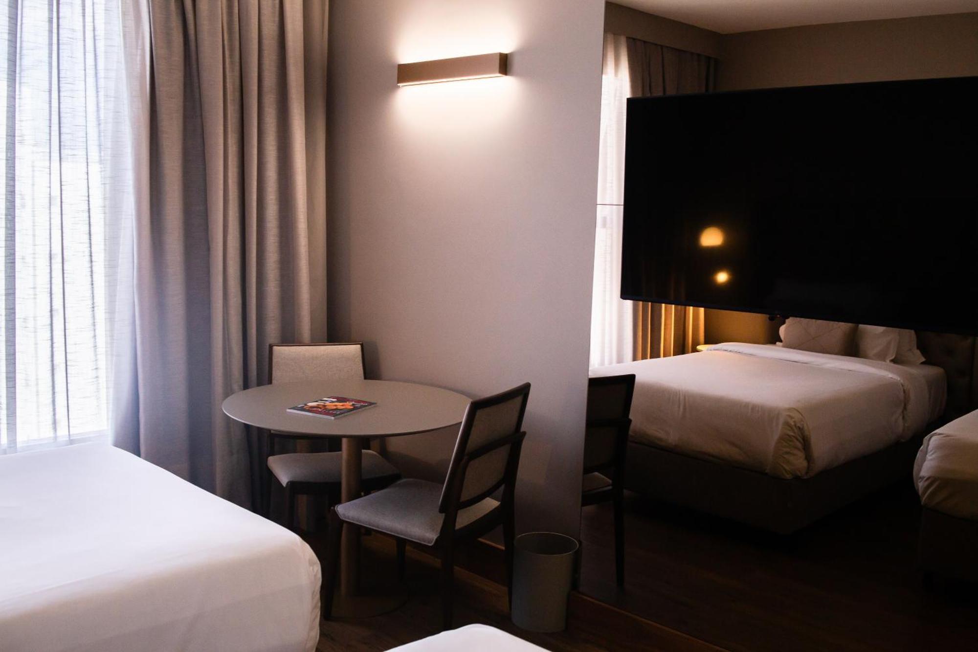 Ouro Minas Hotel Belo Horizonte, Dolce By Wyndham ภายนอก รูปภาพ A room at the hotel