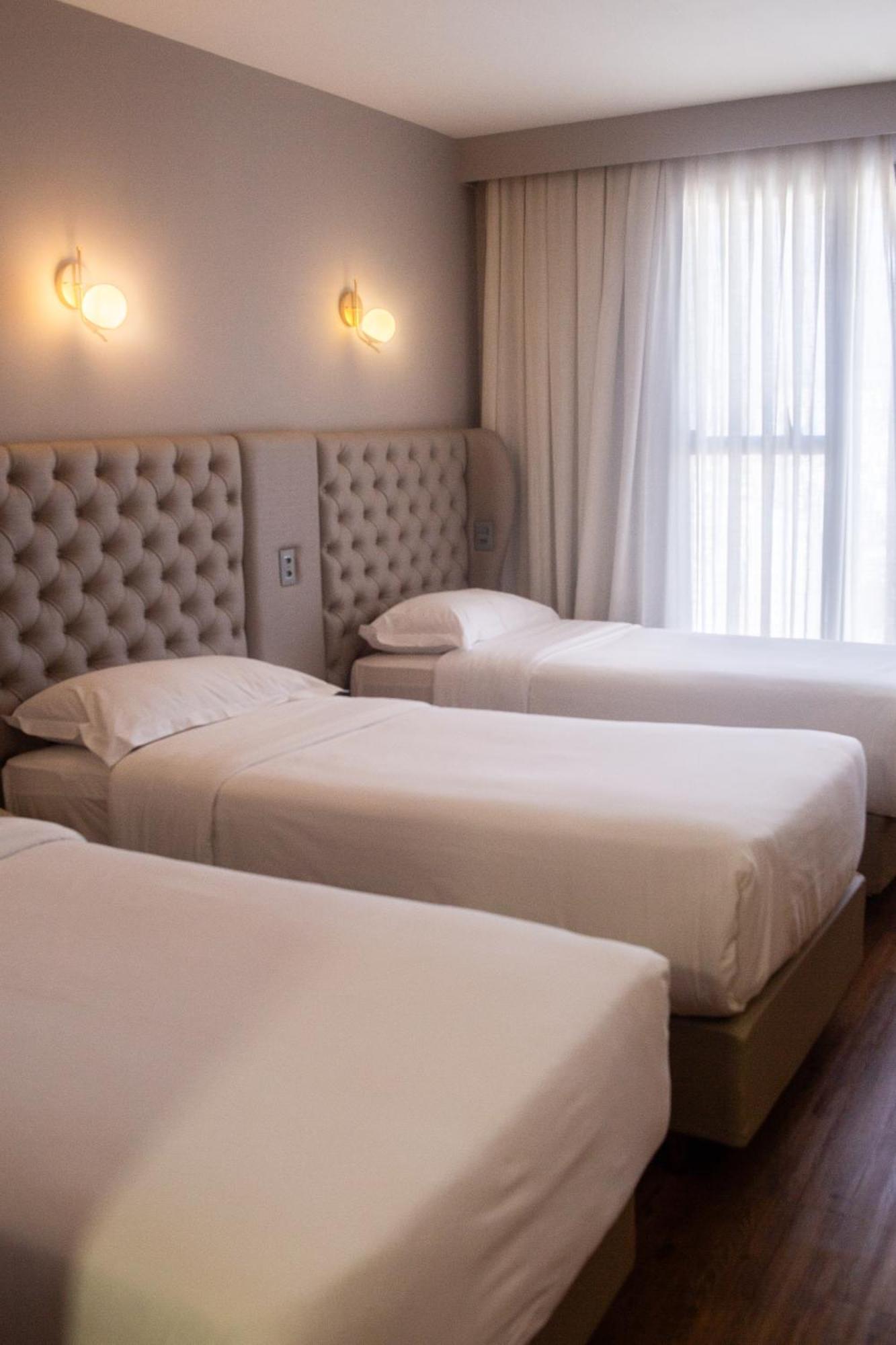 Ouro Minas Hotel Belo Horizonte, Dolce By Wyndham ภายนอก รูปภาพ A room at the hotel